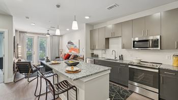 A modern kitchen with stainless steel appliances